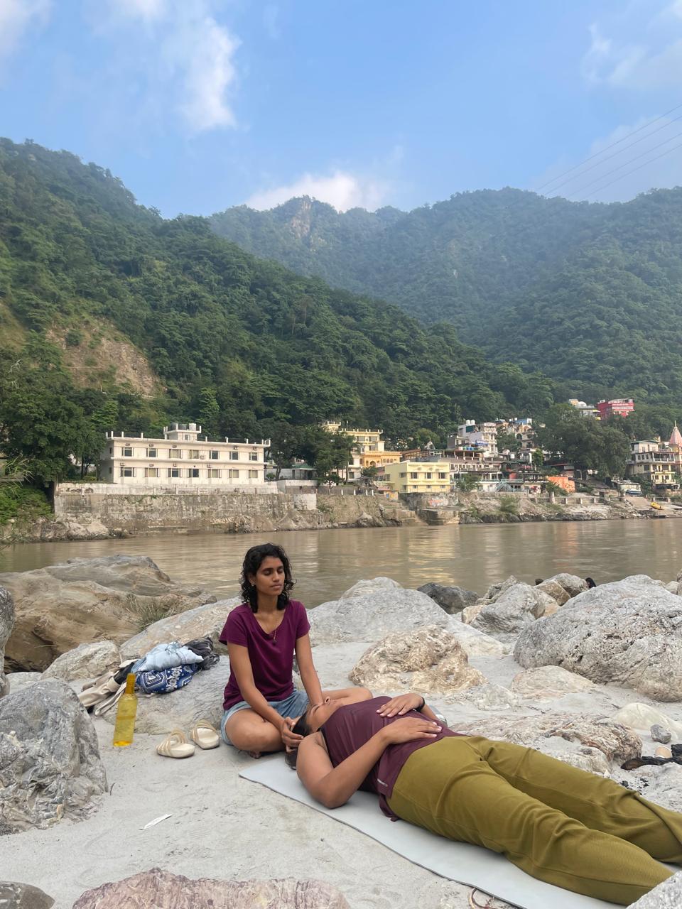 A calm riverside meditation session in Rishikesh