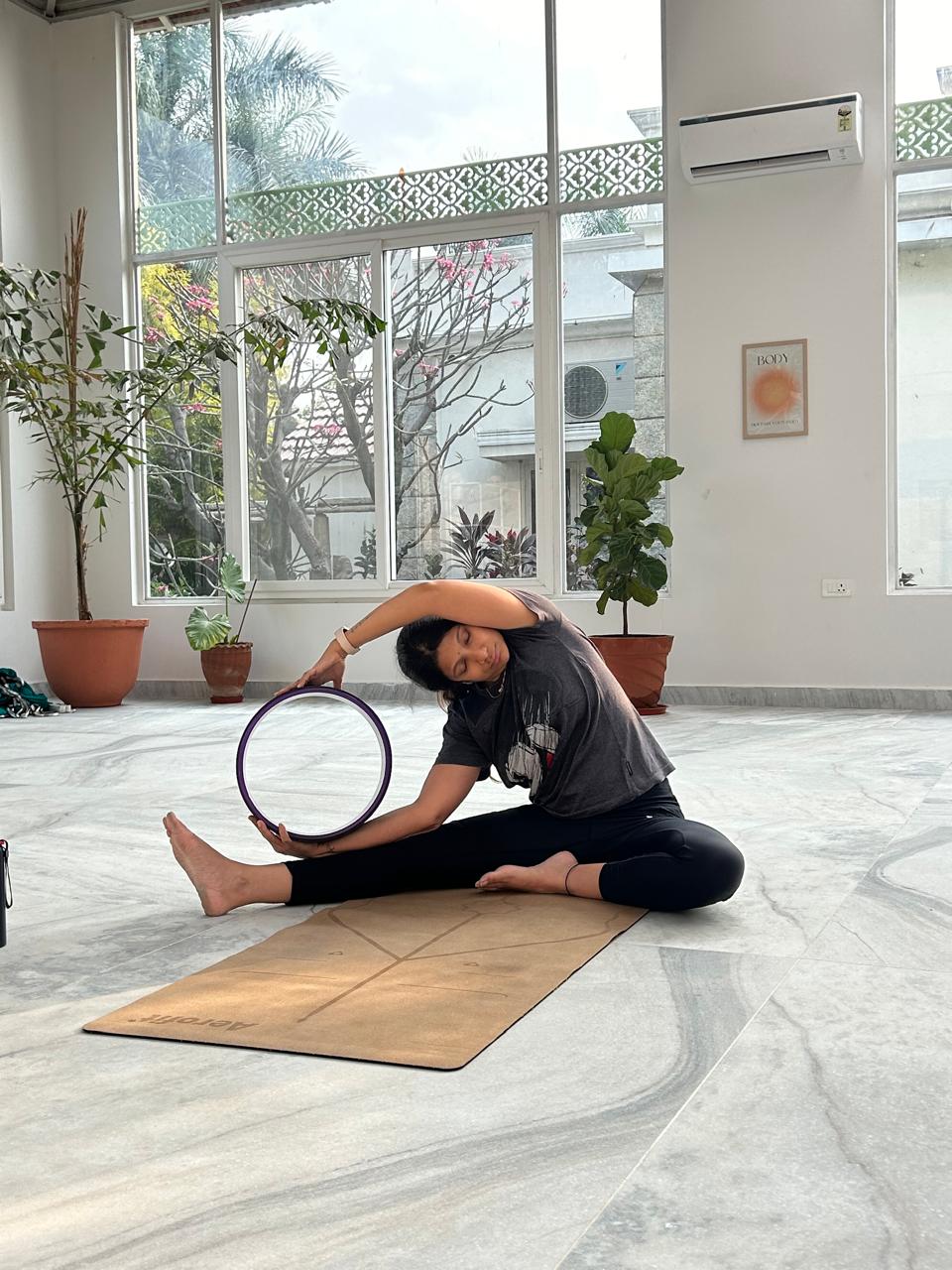 Studio interior — yoga wheel side stretch